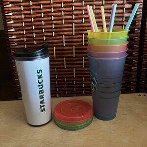 Assorted Starbucks cups and traveling cup, tumbler, mug